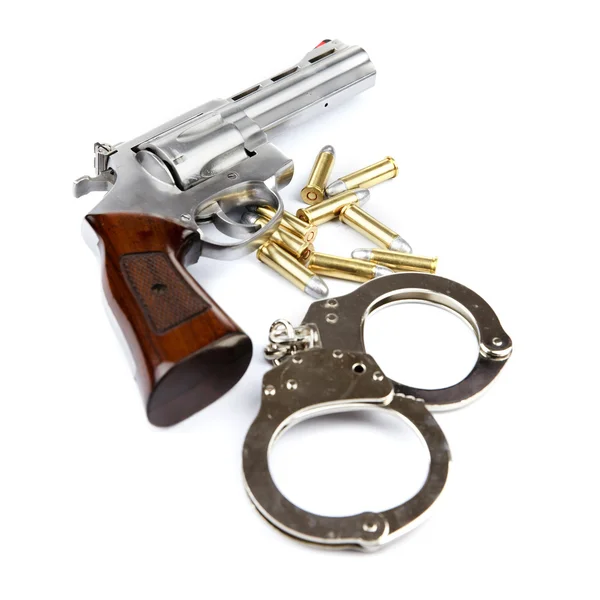 Gun, bullets and handcuffs isolated on white background — Stock Photo, Image