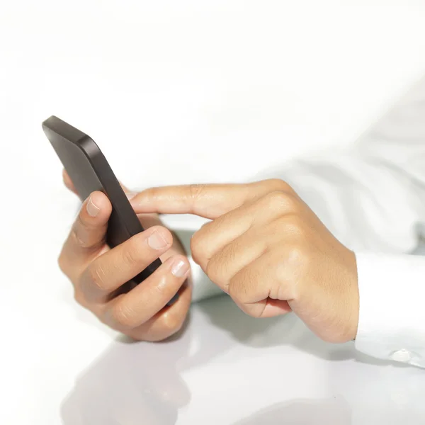 Businessman using phone — Stock Photo, Image