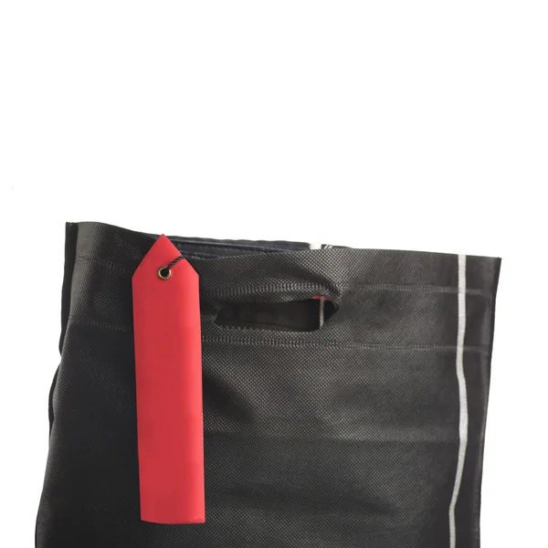 Boş etiket ve kot alışveriş çantası — Stok fotoğraf