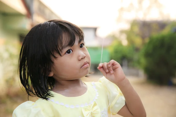 Asian little girl with innocent purity — Stock Photo, Image