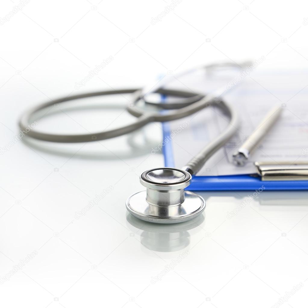 Stethoscope with blue medical clipboard