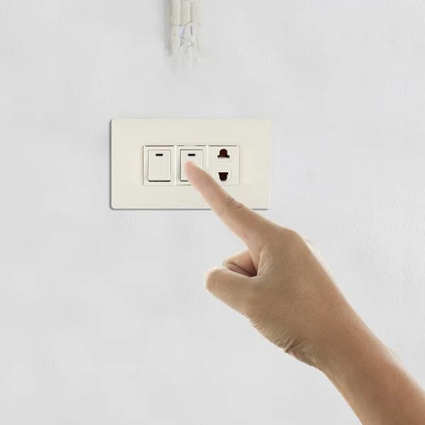Turning Off Light Switch — Stock Photo © Naypong 27711083