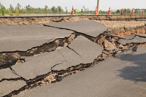 Cracked asphalt road — Stock Photo, Image