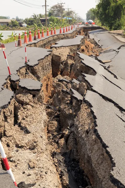 Cracked asphalt road — Stock Photo, Image
