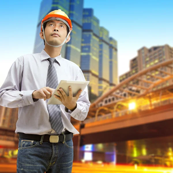 Engineers and architects using digital tablet — Stock Photo, Image