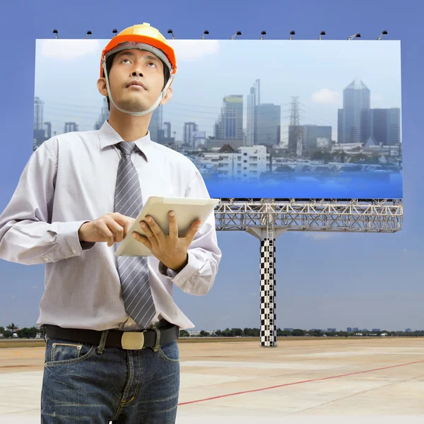 Engineers and architects using digital tablet — Stock Photo, Image