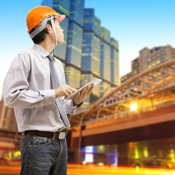 Engineers and architects using digital tablet — Stock Photo, Image