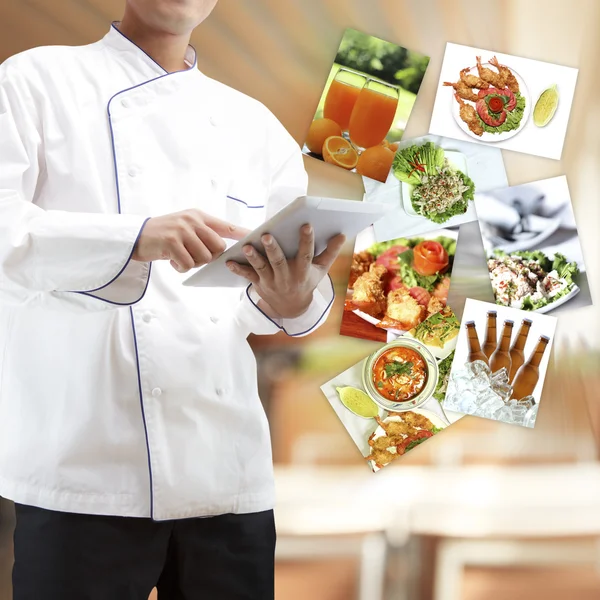 Chef using digital tablet — Stock Photo, Image