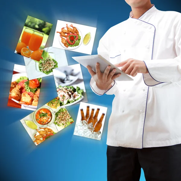 Chef using digital tablet — Stock Photo, Image