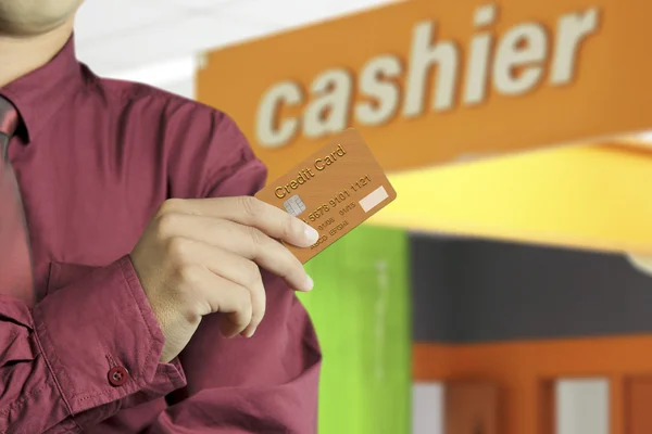 Cropped view of Businessman hand holding credit card — Stock Photo, Image