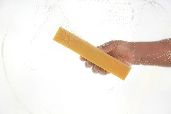 Window cleaner using a sponge — Stock Photo, Image