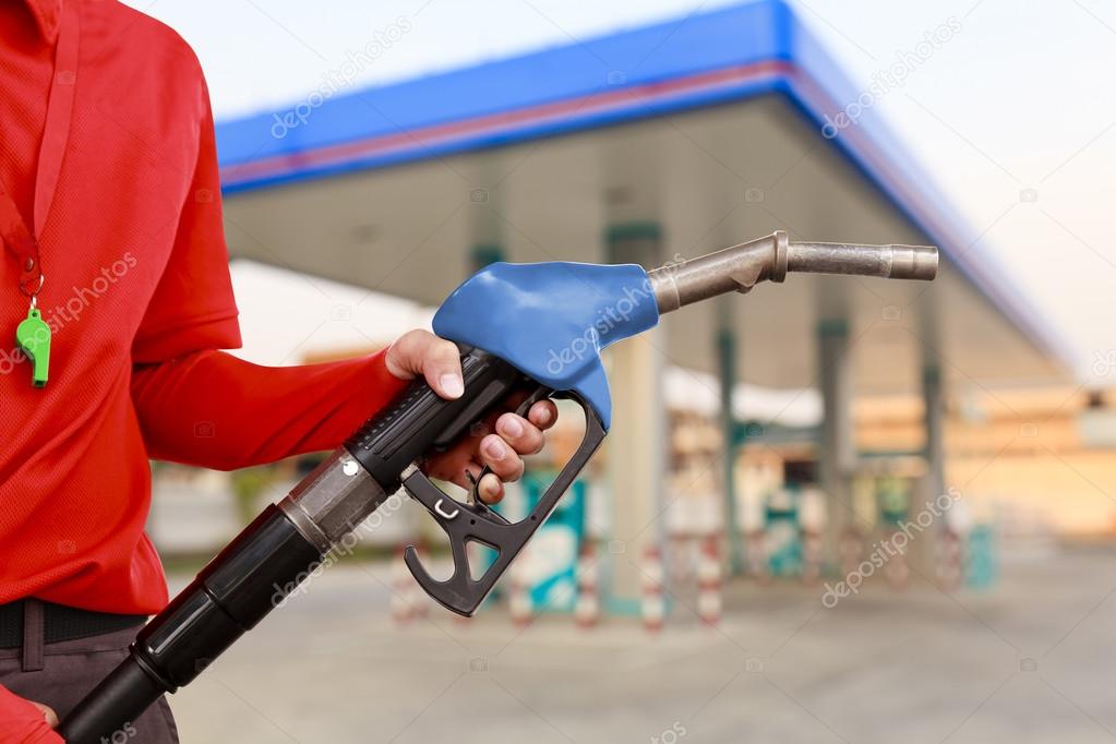 Service station worker in gas station