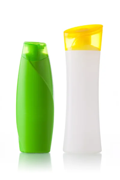 Green and white plastic bottle — Stock Photo, Image