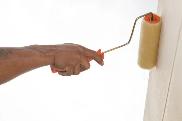 Painting with roller on wall — Stock Photo, Image