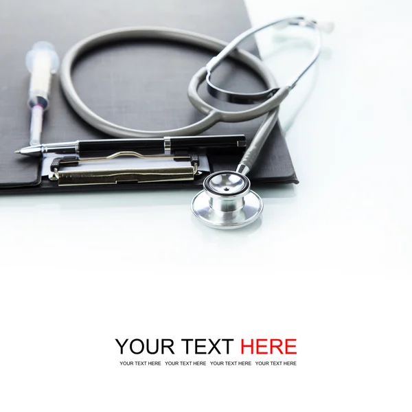 Stethoscope with black medical clipboard — Stock Photo, Image