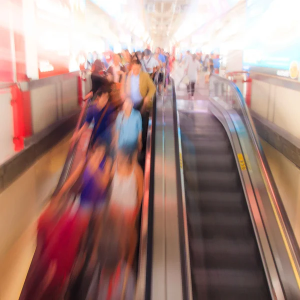 City people walking in skytrain station in motion blur Royalty Free Stock Images
