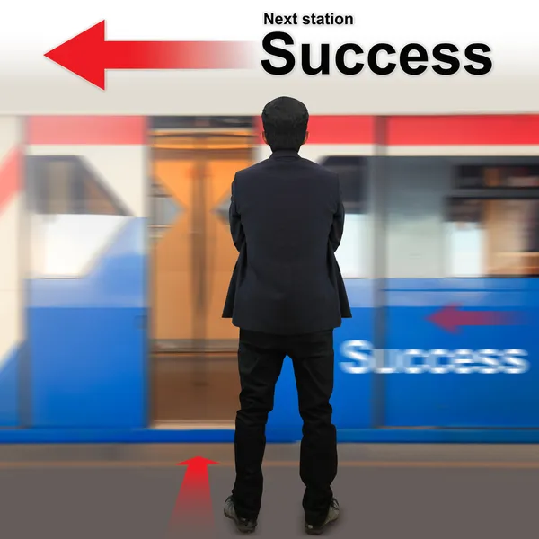 Businessman on the sky train station — Stock Photo, Image