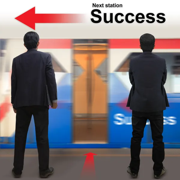 Businessman on the sky train station — Stock Photo, Image