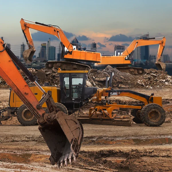 Excavator and grader — Stock Photo, Image