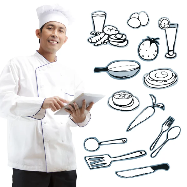 Chef using digital tablet — Stock Photo, Image