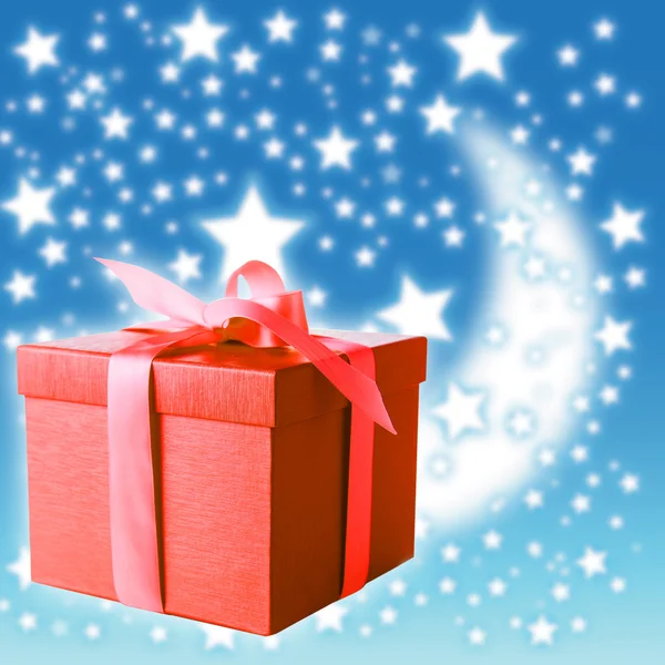 Caixa de presente vermelho no fundo de Natal — Fotografia de Stock