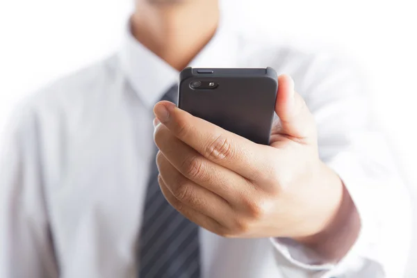 Homem segurando telefone celular — Fotografia de Stock