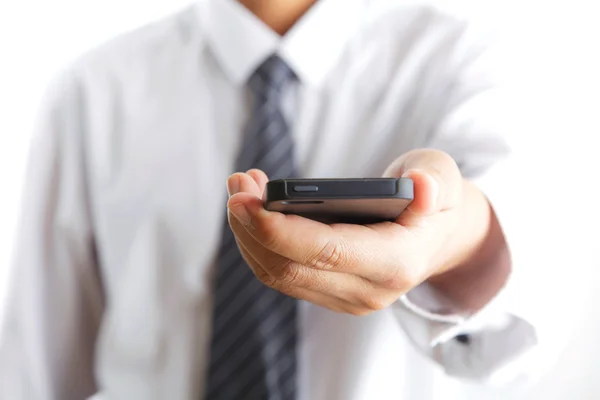 Uomo in possesso di telefono cellulare — Foto Stock