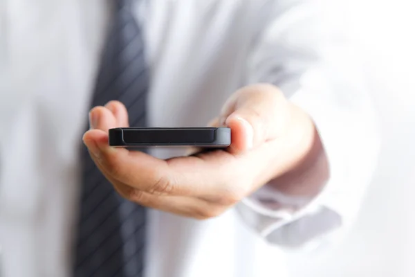 Man holding mobile phone — Stock Photo, Image