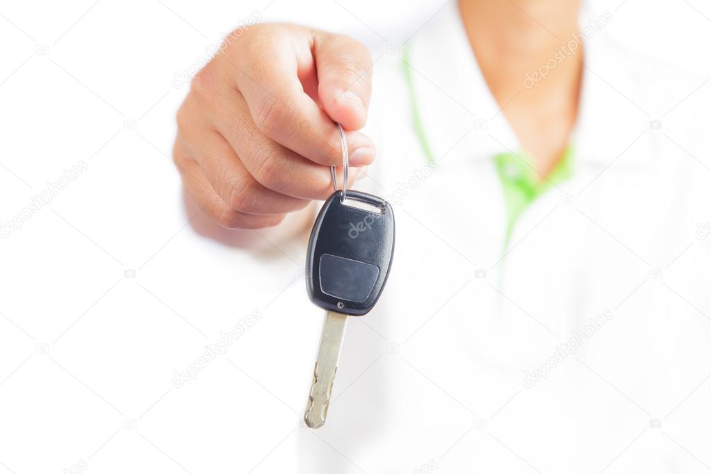 Man showing a car key