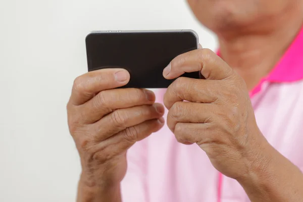 Senior man using phone — Stock Photo, Image