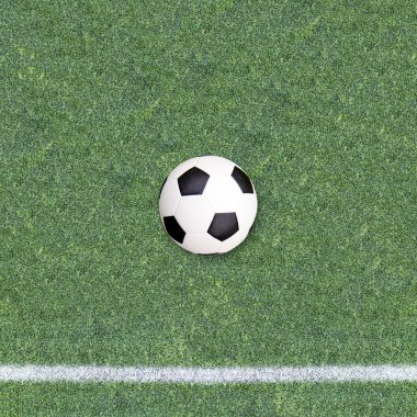 Futbol sahasında futbol topu