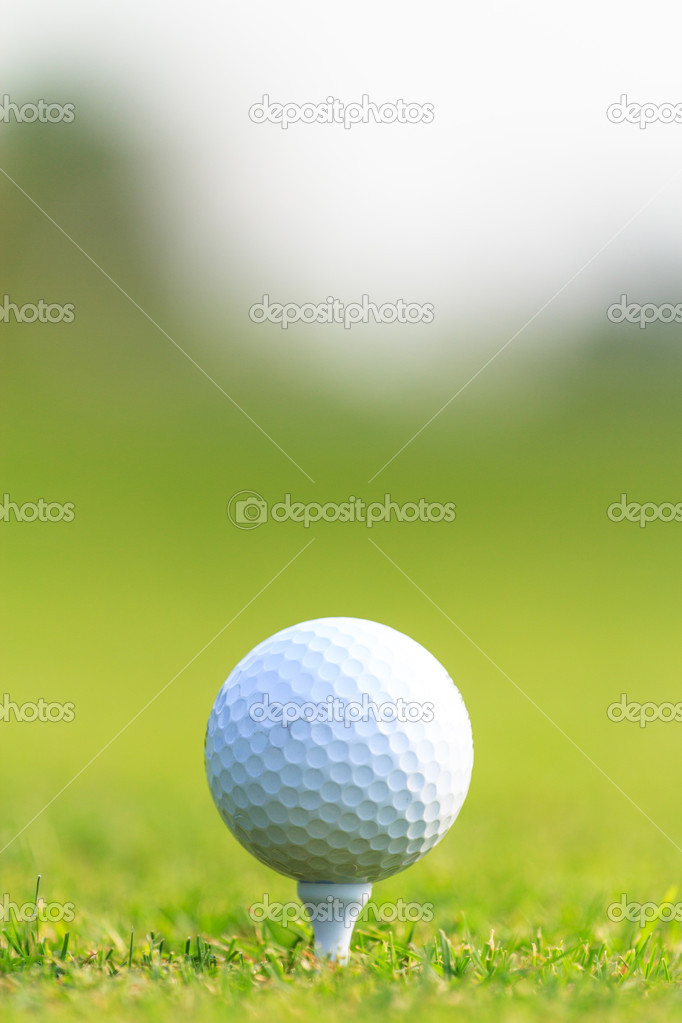 Golf ball on green grass