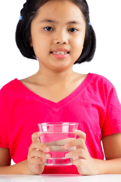 Little girl with glass of water — Stock Photo, Image