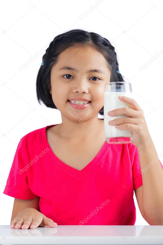 Girl drinks milk