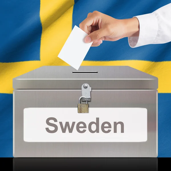 Hand with ballot and metal box — Stock Photo, Image