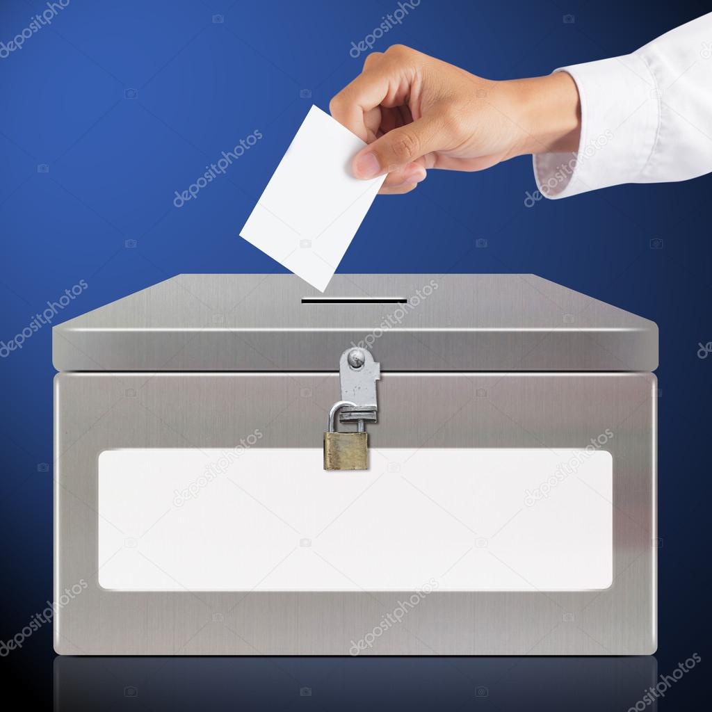 Hand with ballot and metal box
