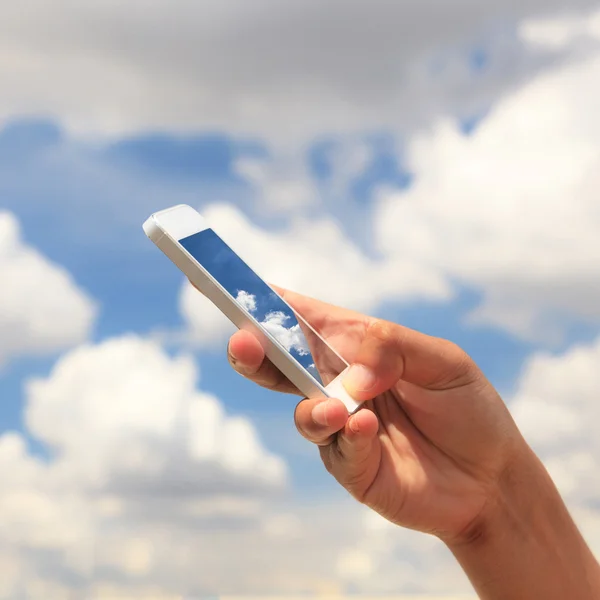 Teléfono en mano — Foto de Stock