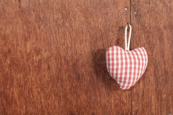 Fabric heart on the wall — Stock Photo, Image