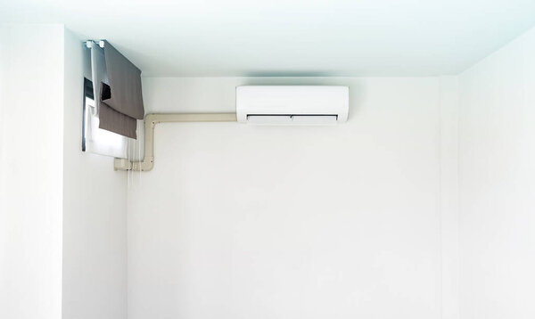  Air conditioner on white wall background