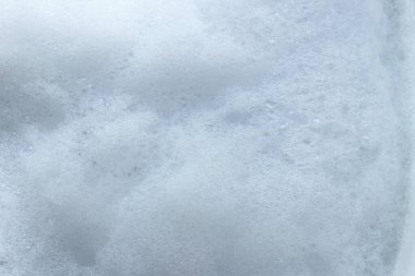 Sabun köpüğü ya da şampuan yıkama arkaplanından beyaz köpük..