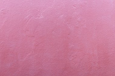 Soyut duvar arkaplan dokusunda kırmızı beton ya da çimento malzeme.