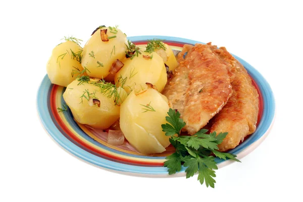 Traditional dinner potatoes with fish — Stock Photo, Image