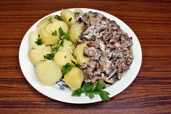 Mushroom sauce with potatoes — Stock Photo, Image