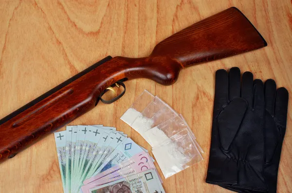 Bags of drugs,  polish money and gun — Stock Photo, Image