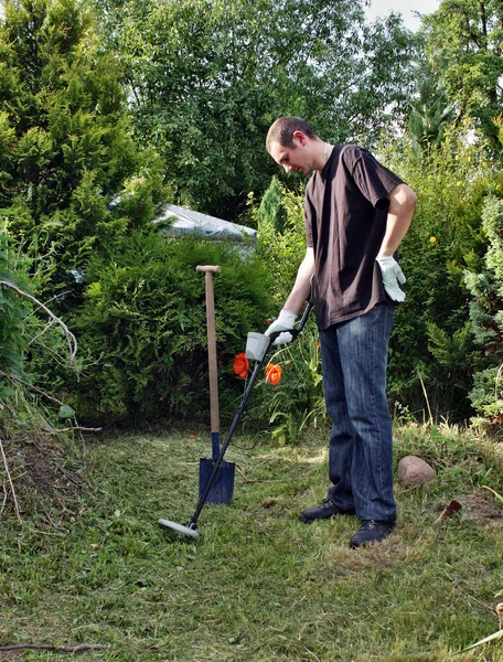 Man with metal detector — Stock Photo, Image