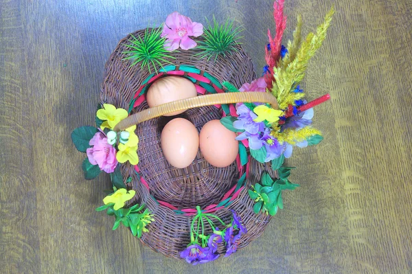 Three eggs in basket — Stock Photo, Image
