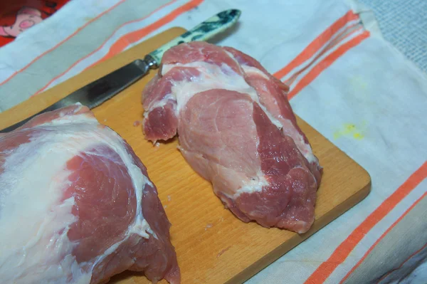 Cutting of pork meat — Stock Photo, Image