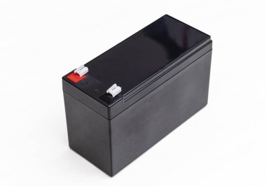 Closeup view of the black rechargeable battery for uninterruptible power supply isolated on white background.