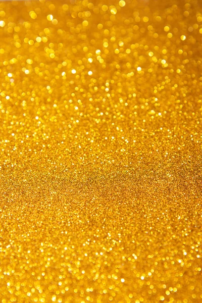 Abstrakte goldene Szenekulisse. Funkelnder Hintergrund aus Lichtern. Festlich verschwommener Hintergrund — Stockfoto