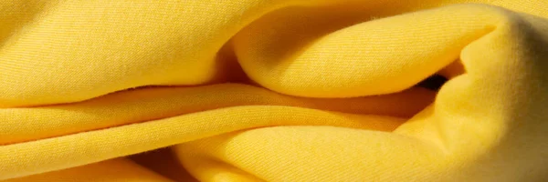 Φωτεινή, κίτρινη, αφράτη, ελαφριά κουβέρτα. Υφή υφάσματος υφάσματος — Φωτογραφία Αρχείου